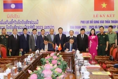 Vietnamese, Lao provinces augment all-round relations