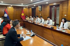 Hanoi delegation on Lao visit