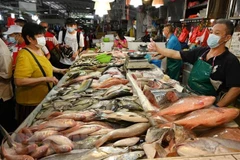 Singapore’s core inflation eases in March