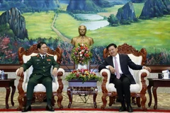 Vietnam, Laos beef up defence cooperation