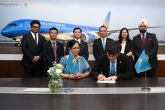 At the signing ceremony (Photo: VNA)