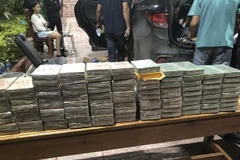 Border forces in Quang Tri province seize heroin smuggled from Laos into Vietnam on May 23. (Photo: VNA) 