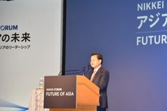 Deputy Prime Minister Le Minh Kha speaks at the forum. (Photo: VNA)