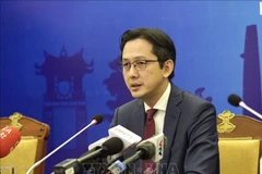 Deputy Minister of Foreign Affairs Do Hung Viet chairs a press conference announcing Vietnam's national report on human rights protection and promotion (Photo: VNA)