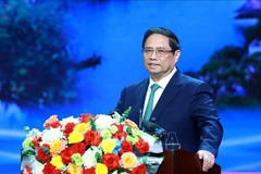 Prime Minister Pham Minh Chinh speaks at the event. (Photo: VNA)