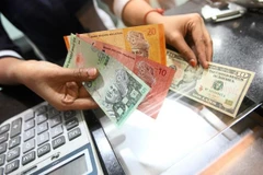 Malaysia to apply new exchange rate