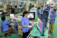 Local enterprises upbeat about business production in H2