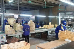 Banks are hesitant to provide unsecured loans to small and medium-sized businesses, being unsure of their ability to repay. (Photo: VNA) 