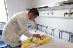 Lao newborn given complicated cardiac surgery by Vietnamese doctors