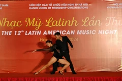 Latin dances excite audiences at the event (Photo: VNA)