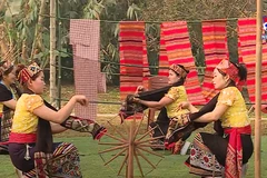 Festive activities taking place in ethnic culture village