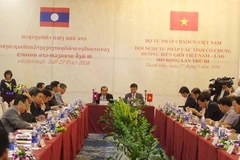 Vietnamese, Lao border localities foster justice cooperation 