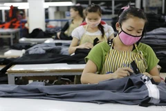 Vientiane to issue temporary working permit for migrant workers