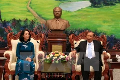 Vietnam, Laos Parties step up theoretical information exchanges