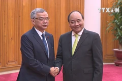 PM urges Laos to monitor impacts of hydropower plants