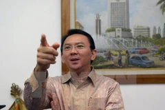 Jakarta governor declared suspect in blasphemy case