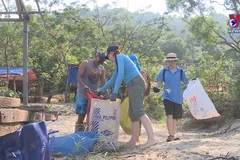 Expats join local people to clean up coastal city