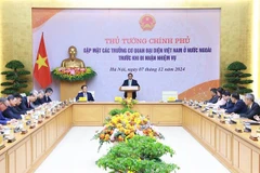 Prime Minister Pham Minh Chinh on December 7 meets with ambassadors and heads of Vietnam's representative offices abroad before they take on their new assignments. (Photo: VNA)