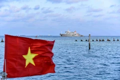 Vietnamese flag is seen at Sinh Ton Dong (Sin Cowe East) island, part of Vietnam’s Truong Sa archipelago in April, 2023. (Photo: baoquocte.vn)