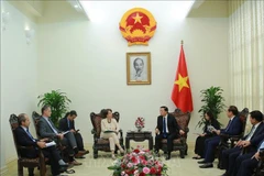 Deputy Prime Minister Tran Hong Ha receives AFD Deputy Director General Marie-Hélène Loison in Hanoi. (Photo: VNA)