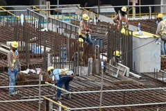 Workers at a construction site in Singapore in 2021. (File photo: AFP)