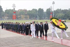 Party and State leaders pay tribute to President Ho Chi Minh at his mausoleum in Hanoi on July 27. (Photo: VNA) 