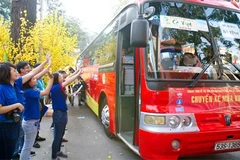 Buses bring Tet closers to disadvantaged students