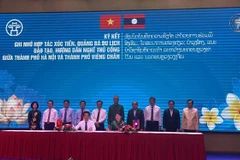 Hanoi, Vientiane expand business cooperation