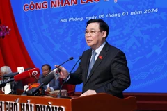 Top legislator meets workers in Hai Phong city