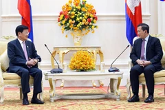 Cambodia, Laos vow to boost bilateral ties