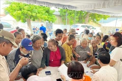HCM City delegation provides health check-ups for needy people in Laos