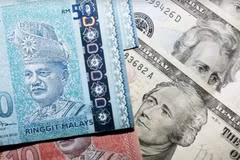 Malaysia works to strengthen local currency