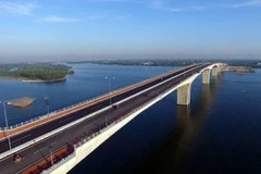 Cua Dai Bridge: Brings joys to local people by Thu Bon River