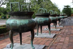 Photo: Cuu dinh” (Nine Dynastic Urns) are placed in front of the Hien Lam Pavilion inside The To Temple in the Hue Imperial Citadel (Dai Noi) for over 200 years. (Photo: VNA)