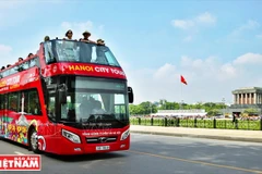 Wandering around Hanoi with double-decker bus city tour