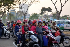 Saigon rugs up as “cold” weather descends