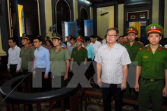 Court hands down 30-year sentence to former bank executive