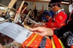 Ethnic women uphold traditional brocade weaving