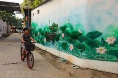 Murals help fishing village attract more visitors