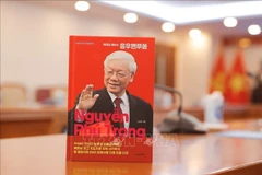 The 420-page book details his work at the Communist Review, his insightful theory and criticism articles, and achievements during his tenure as Secretary of the Hanoi Party Committee (2000-2006), Chairman of the National Assembly (2006-2011), and his role as the highest leader of Vietnam during the 11th, 12th and 13th National Party Congresses (Photo: VNA)