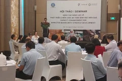 Vietnamese and Irish experts at a conference on capacity enhancement for effective biosecurity strategy for Vietnam held in the Mekong Delta city of Can Tho on July 24. (Photo: nhandan.vn)