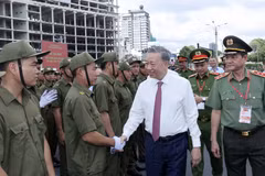 President To Lam meets with the public security and order protection force in HCM City. (Photo: VNA)