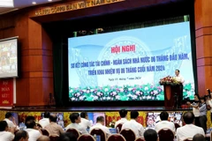 An overview of the six-month preliminary conference of the financial industry held by the Finance Ministry in Hanoi on July 15. (Photo: VNA)