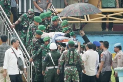 Three Indonesian officers demoted after wives post comments on security minister attack