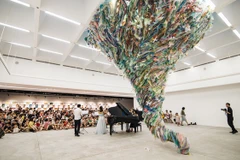 Artworks made from used plastic warn of environmental damage