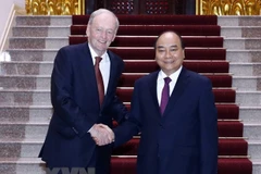 Government leader hosts former Canadian PM