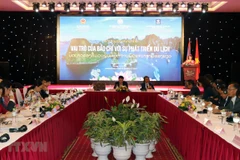 Role of Vietnamese, Lao media in tourism development discussed