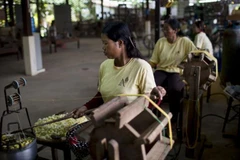 Cambodia to raise minimum wage for textiles, footwear workers