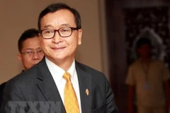 Cambodian court orders arrest of exile opposition leader 