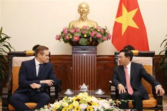 Deputy PM Pham Binh Minh receives Lithuanian interior minister